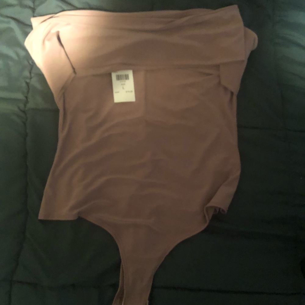 Cross cross body suit